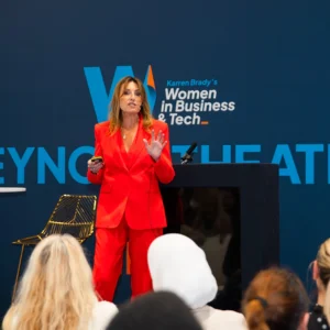 Lou Robey speaking at Karren Brady's Women in Business & Tech Expo in London on 2 Oct 2024